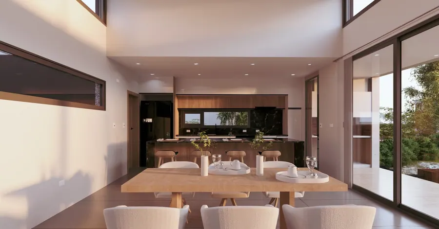Casa Em · Comedor y cocina en doble altura